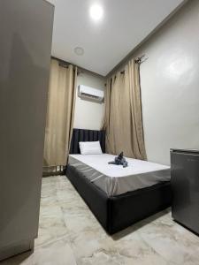 Voodi või voodid majutusasutuse Lucky Hostel toas