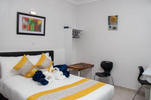 Postel nebo postele na pokoji v ubytování Eldorado Rustic Hotel
