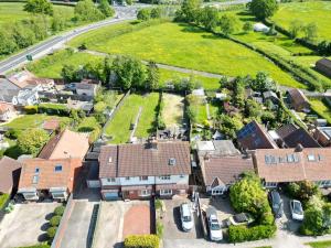 an aerial view of a suburb with houses and cars at Top of Family Occupied House Double Room with Free Parking in York in York