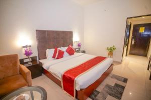 Hotel Swarn Towers客房内的一张或多张床位