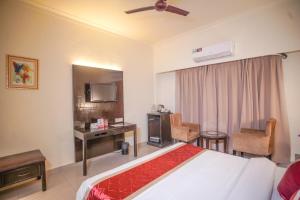 Hotel Swarn Towers客房内的一张或多张床位