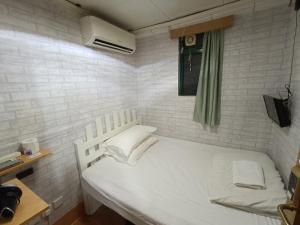 Postel nebo postele na pokoji v ubytování Cozy Inn Jordan Station + 27 fotografií