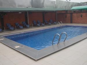Bazén v ubytování Conference Hotel and Suites Sagamu nebo v jeho okolí