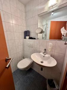 A bathroom at Bed & Rooms, Wörgl Még 21 kép