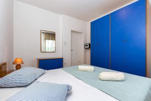 Posteľ alebo postele v izbe v ubytovaní Kuća za odmor s bazenom Emma