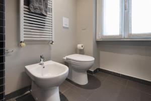 A bathroom at Giresio 41 - Your Penthouse with Rooftop Garden in Milano Navigli - WIFI
