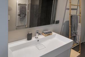 A bathroom at Giresio 41 - Your Penthouse with Rooftop Garden in Milano Navigli - WIFI