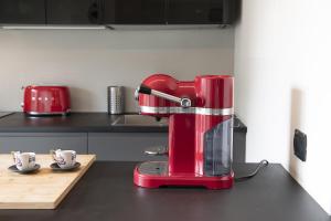 A kitchen or kitchenette at Giresio 41 - Your Penthouse with Rooftop Garden in Milano Navigli - WIFI