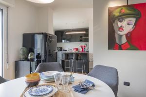 A kitchen or kitchenette at Giresio 41 - Your Penthouse with Rooftop Garden in Milano Navigli - WIFI