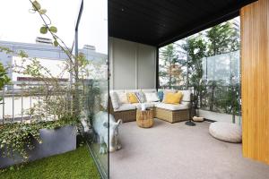 A garden outside Giresio 41 - Your Penthouse with Rooftop Garden in Milano Navigli - WIFI