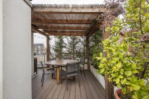 A balcony or terrace at Giresio 41 - Your Penthouse with Rooftop Garden in Milano Navigli - WIFI