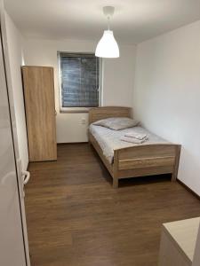 Postel nebo postele na pokoji v ubytování Gästehaus EMELI