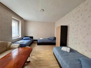 Postel nebo postele na pokoji v ubytování Gästehaus EMELI