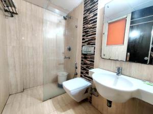 Koupelna v ubytování Hotel Delhi Pride, Karol Bagh