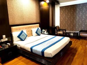 Postel nebo postele na pokoji v ubytování Hotel Delhi Pride, Karol Bagh
