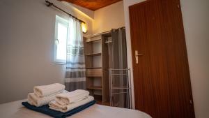 Postel nebo postele na pokoji v ubytování Holiday home Gandalj_2