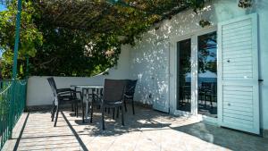 Balkón nebo terasa v ubytování Holiday home Gandalj_2