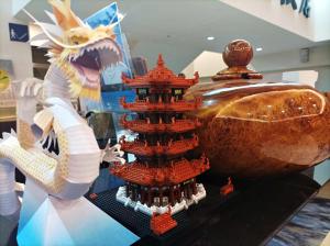 a lego model of a castle next to a bowl at Crystal Hotel in Puli