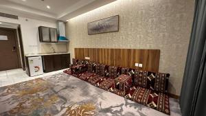 Postel nebo postele na pokoji v ubytování Multazam Al-Nnaseem Hotel