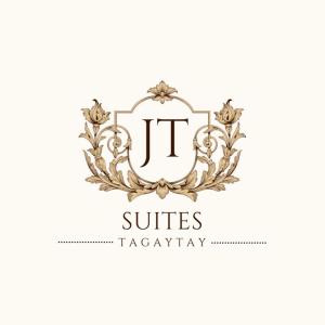 a crest logo with a monogram in a laurelreath at JT Tagaytay Suites in Tagaytay