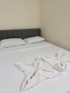Postel nebo postele na pokoji v ubytování Thong Sai Homstay BETONG -ทองใสโฮมสเตย์-