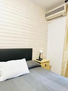 Postel nebo postele na pokoji v ubytování Hostal La Taberna