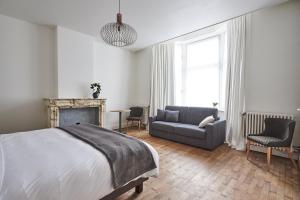Postel nebo postele na pokoji v ubytování Maison Cambier
