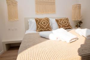 Postel nebo postele na pokoji v ubytování Aidani Luxurious Rooms