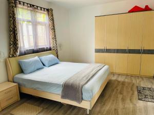 Postel nebo postele na pokoji v ubytování Maison Stacie + 3 fotografie