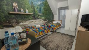 a room with two beds and a painting on the wall at Soul Poznan Free Parking in Poznań