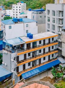 an overhead view of a building with balconies at Napoli Hostel in Cat Ba