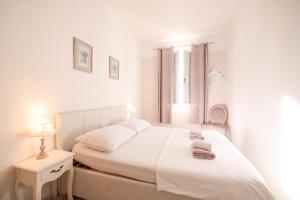 Posteľ alebo postele v izbe v ubytovaní Apartment Floresita