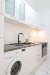 Kuchyňa alebo kuchynka v ubytovaní Apartment Floresita