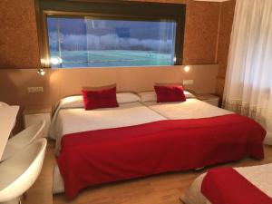 Ein Bett oder Betten in einem Zimmer der Unterkunft Casa Blanco Conde