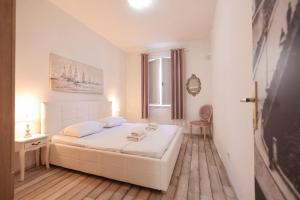 Posteľ alebo postele v izbe v ubytovaní Apartment Floresita