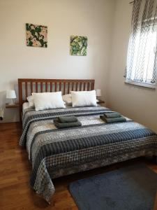 Postel nebo postele na pokoji v ubytování Apartments Glibo