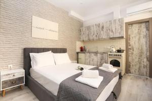 Postel nebo postele na pokoji v ubytování Nickmar Corfu Apartment