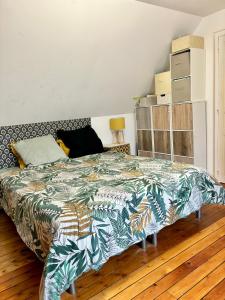 Ένα ή περισσότερα κρεβάτια σε δωμάτιο στο Maison Pontlieue proche tramway