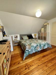 Cama o camas de una habitación en Maison Pontlieue proche tramway