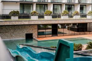 Bazén v ubytovaní VacationClub – Aleja I Armii Wojska Polskiego 6 alebo v jeho blízkosti