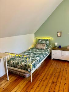 Cama o camas de una habitación en Maison Pontlieue proche tramway
