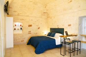 Postel nebo postele na pokoji v ubytování La Suite del Conte - STORIA, CONFORT ed ELEGANZA + 46 fotografií