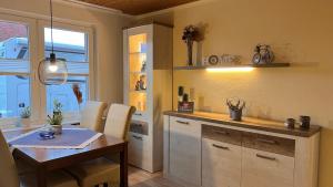 Η κουζίνα ή μικρή κουζίνα στο Ferienhaus Wilhelmshaven Voslapp 78 +11 φωτογραφίες