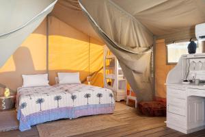 Postel nebo postele na pokoji v ubytování NOMAD GLAMPING