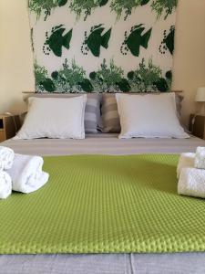 Katil atau katil-katil dalam bilik di Casa Valvo Lido di Noto +55 gambar