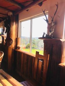 a window in a room with a view at The paulwood home cabin in Nuwara Eliya