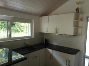 Kuchyň nebo kuchyňský kout v ubytování Wohnresidenz Casa Fortuna