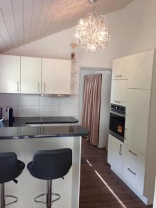 Kuchyň nebo kuchyňský kout v ubytování Wohnresidenz Casa Fortuna