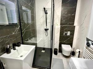 A bathroom at Apartmány PREMIUM se soukromým parkováním