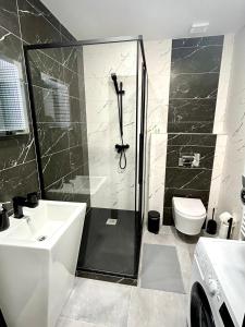 A bathroom at Apartmány PREMIUM se soukromým parkováním